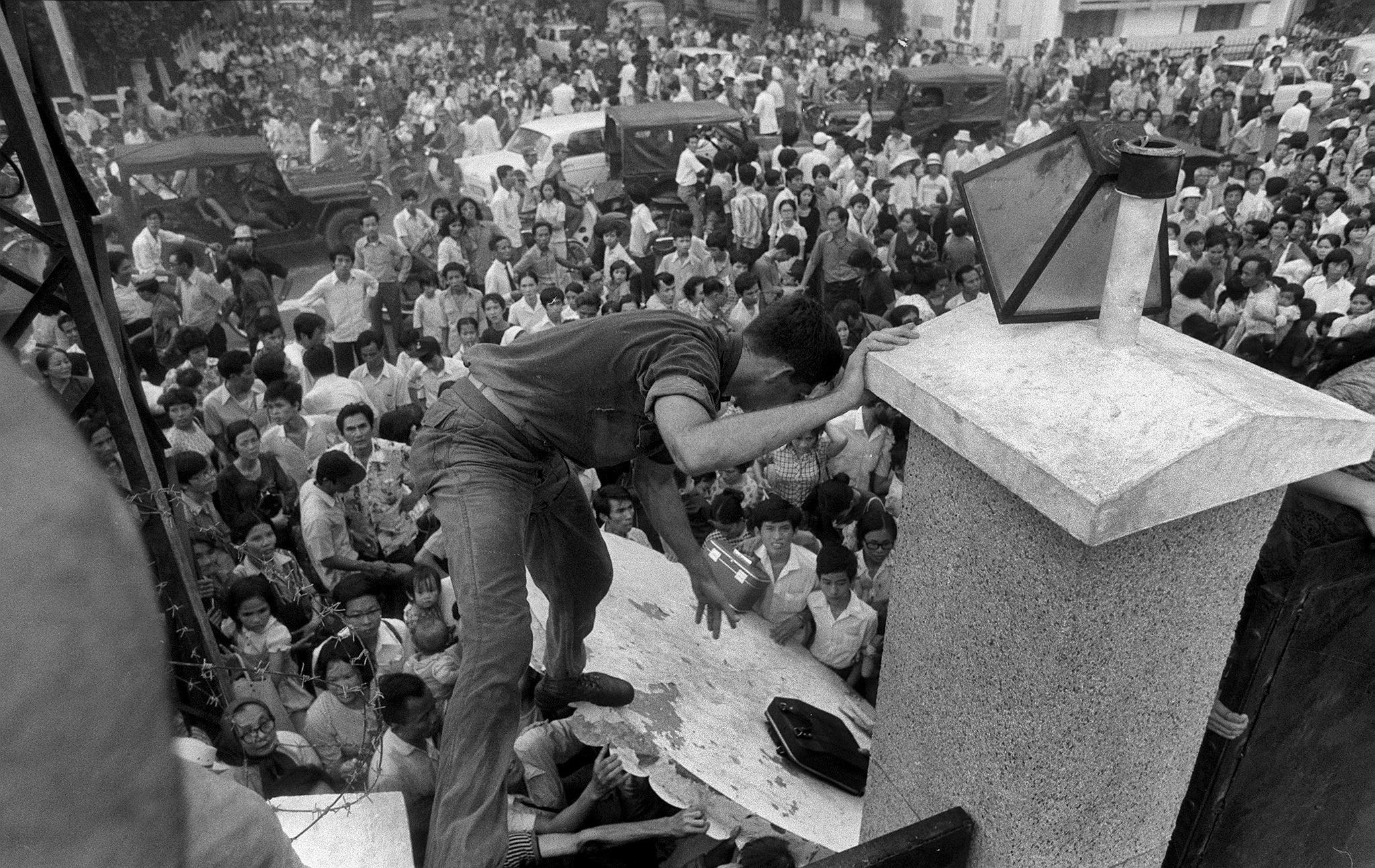 As communist troops streamed into Saigon, a few remaining reporters kept photos and stories flowing