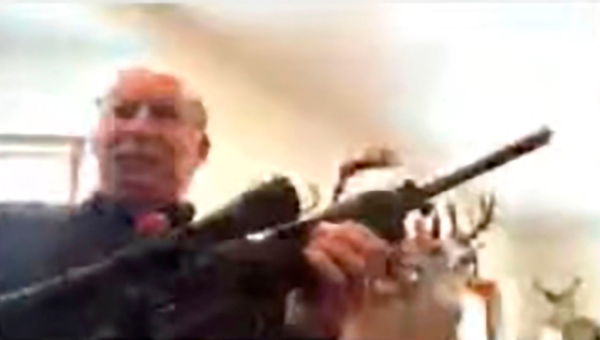Pandemic-era lawsuit over gun at Michigan Zoom meeting is settled for $100,000