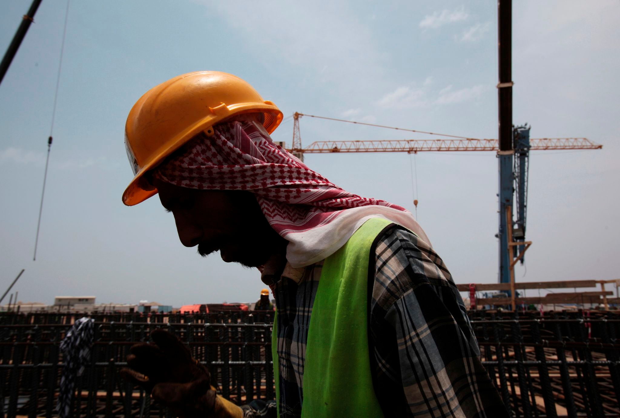 Rights groups say migrant workers are dying on Saudi job sites as kingdom prepares for World Cup
