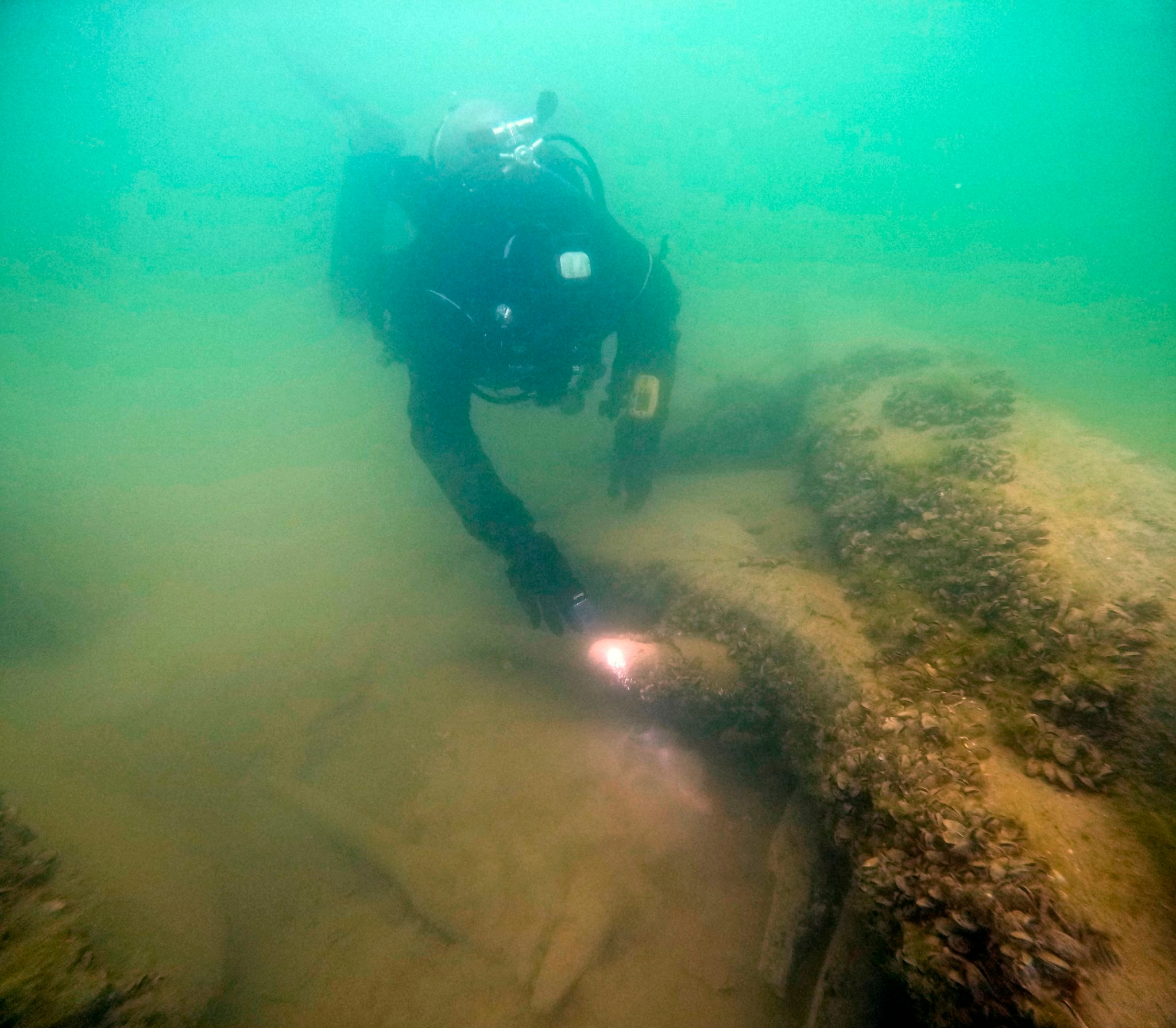 Angler fishing in Lake Michigan fog discovers remains of abandoned tugboat J.C. Ames