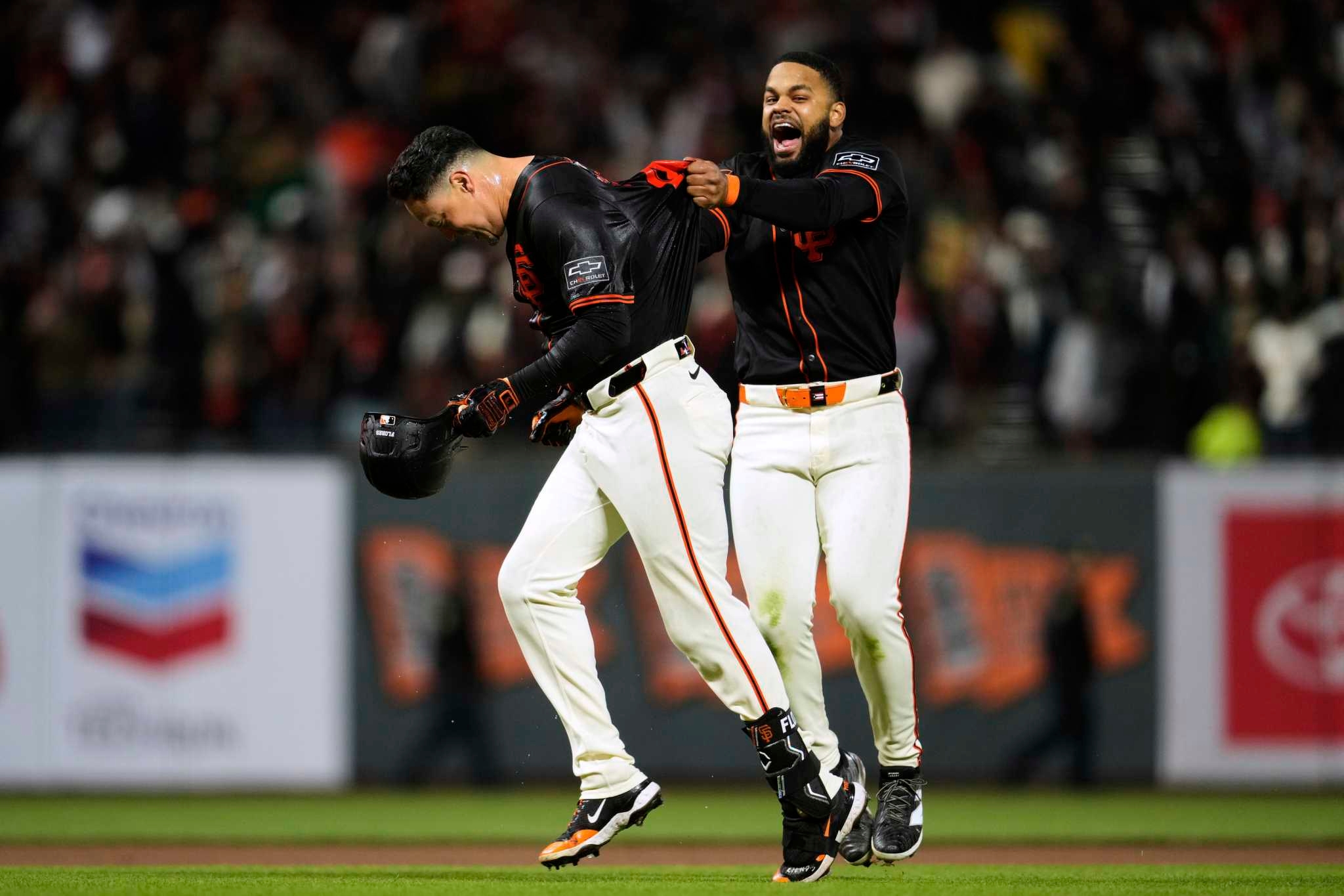 Giants' Wilmer Flores walks it off in 10th after 9-pitch battle with A's Mason Miller
