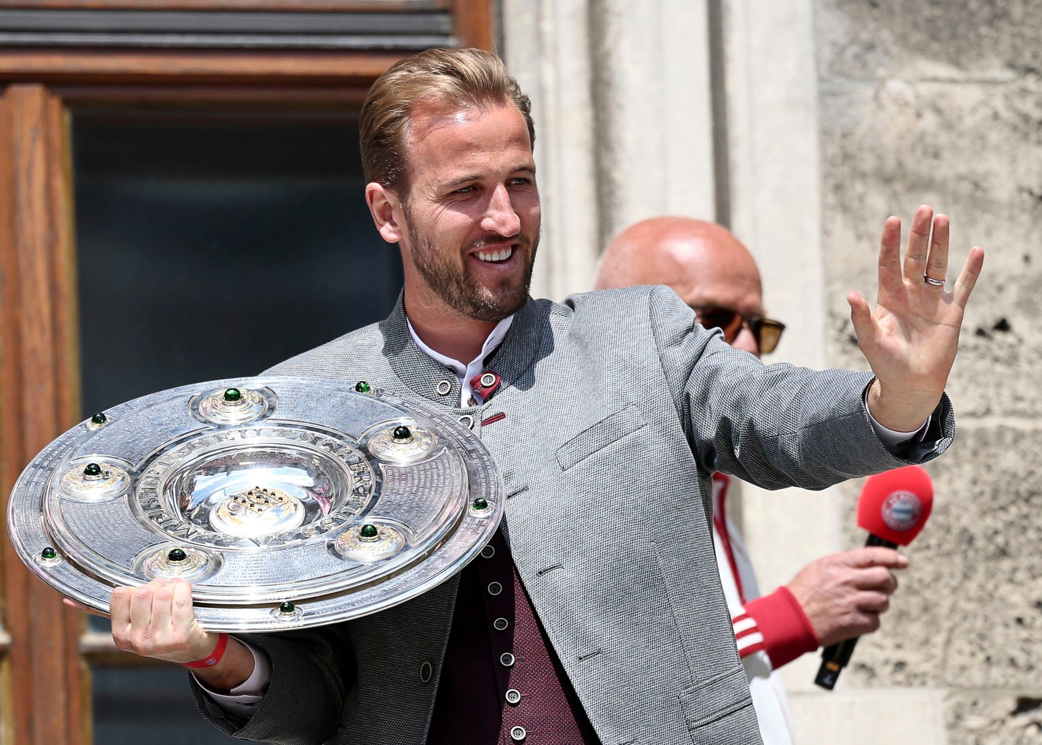 In leather and dirndls, Bayern Munich toasts its men's and women's teams for Bundesliga double