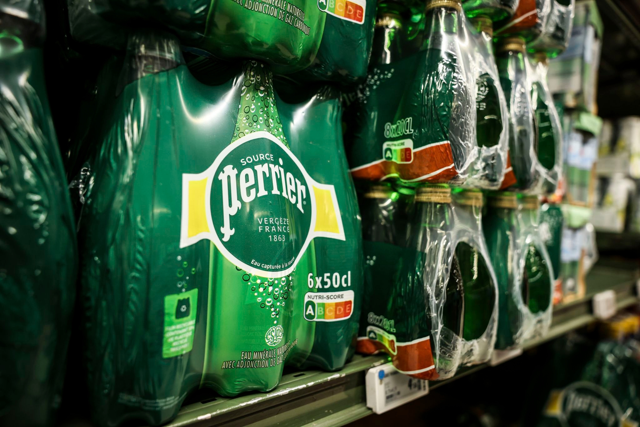 An inquiry says France's government covered up Nestle's illegal treatment of bottled water
