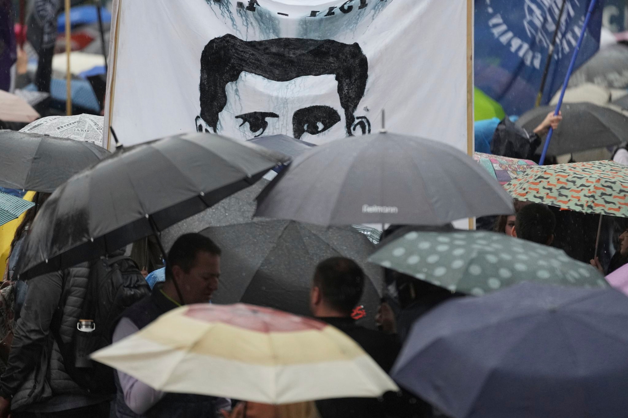 Thousands brave heavy rain to protest Serbia's crackdown on universities