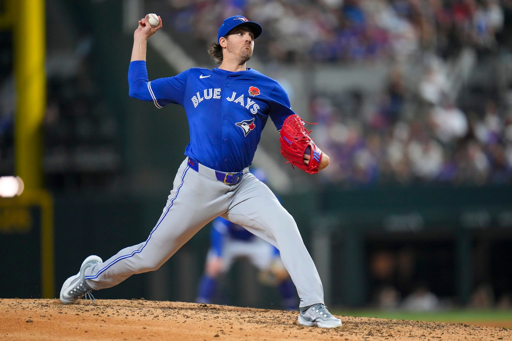 Gausman pitches 8 innings and Varsho homers as Blue Jays beat Rangers