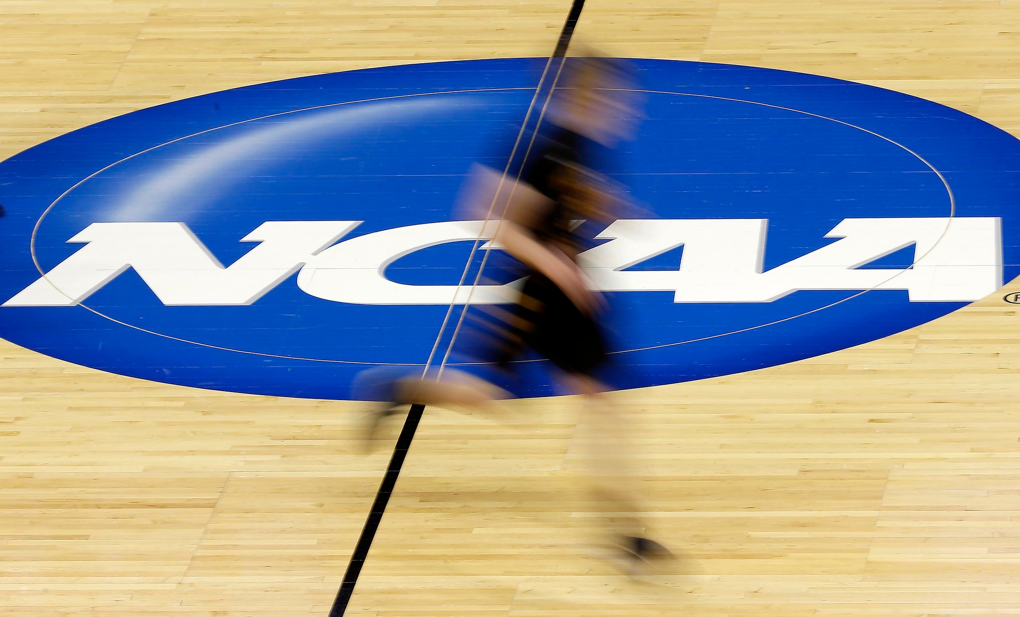 College sports lurches forward, hoping to find a level playing field with fewer lawsuits