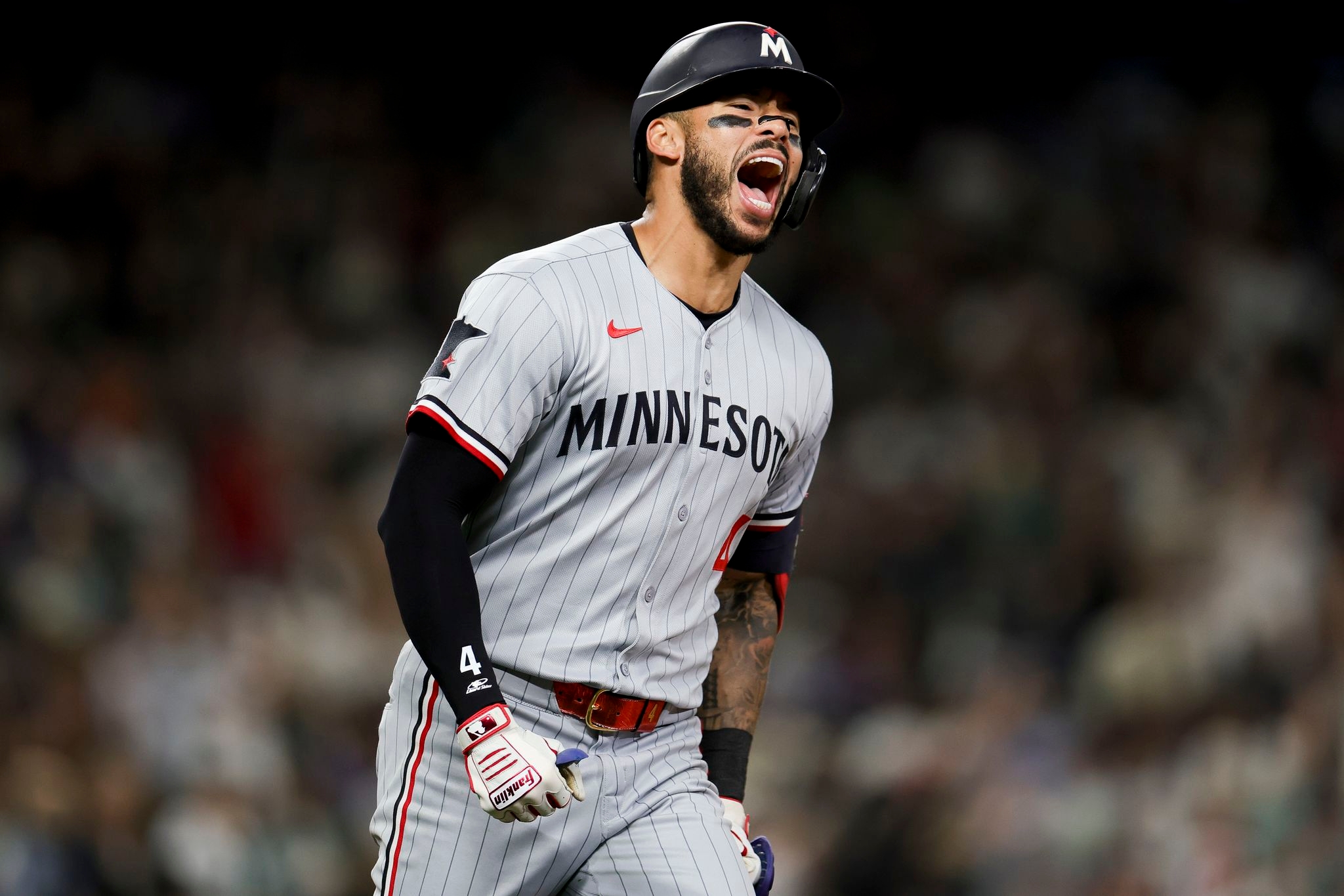 Correa hits a 2-run homer in the 10th in the Twins' 12-6 comeback victory over the Mariners
