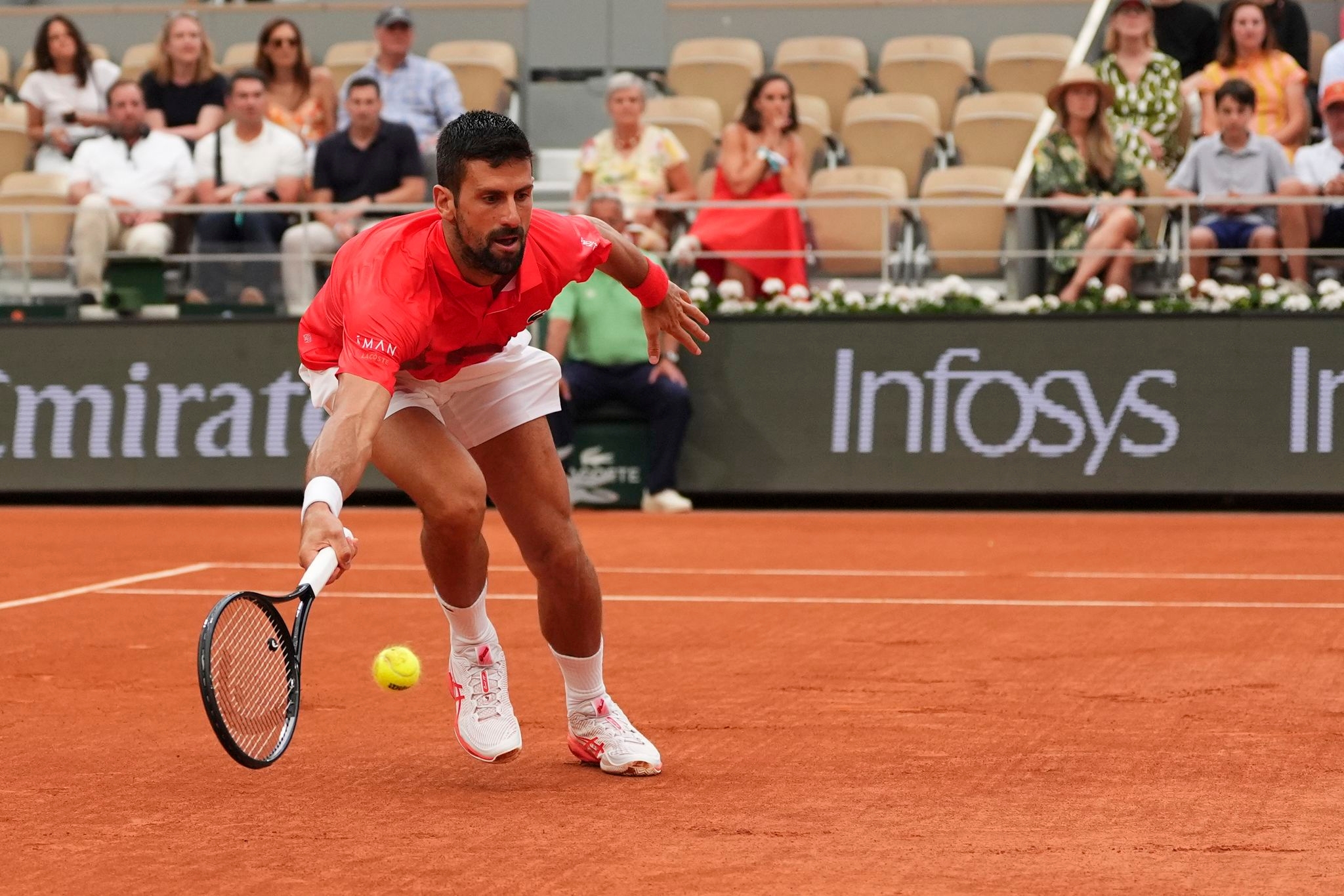 French Open: Novak Djokovic wins easily in a match filled with Champions League celebrations