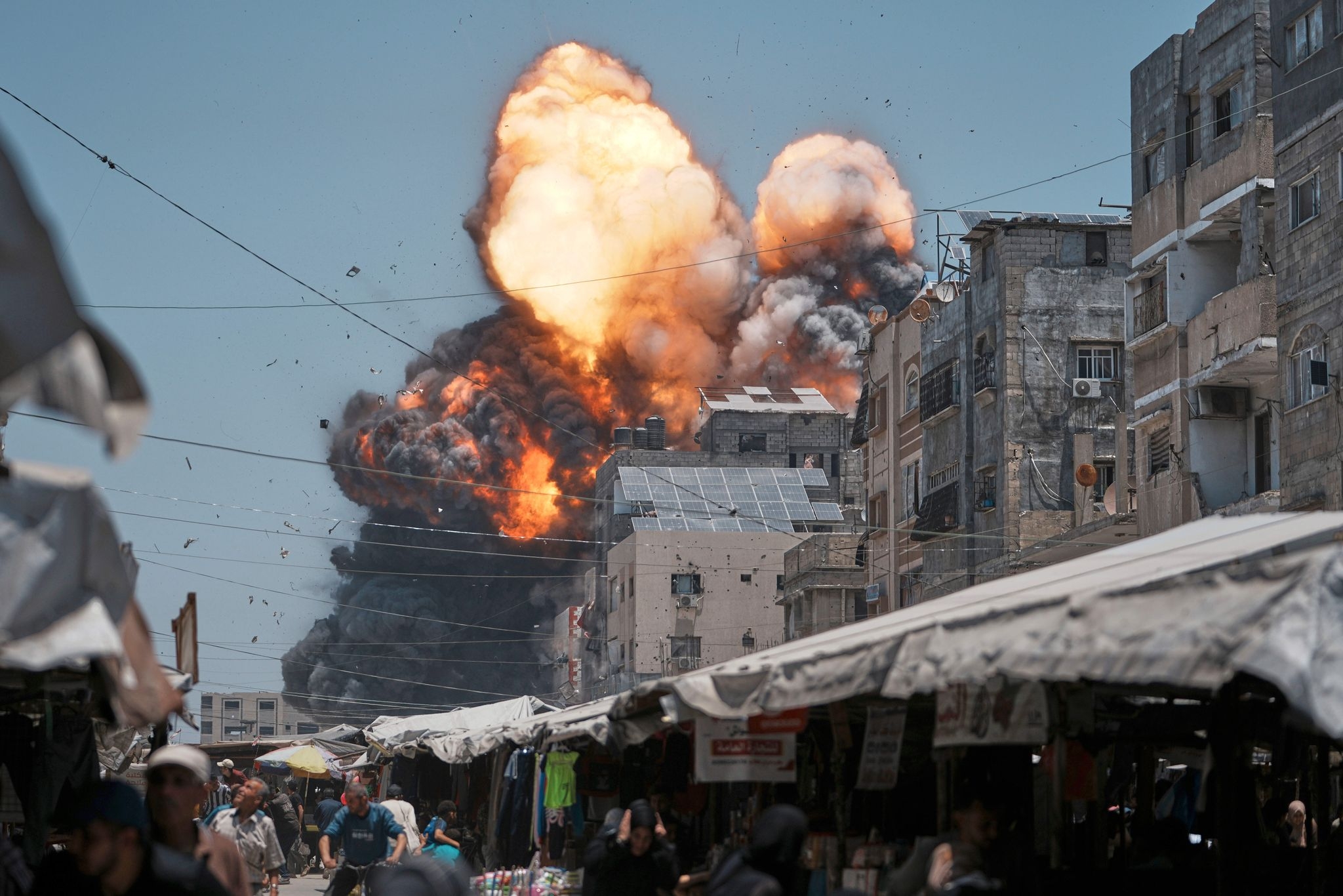 AP PHOTOS: An AP photographer captures the moment an Israeli airstrike slammed into Gaza City