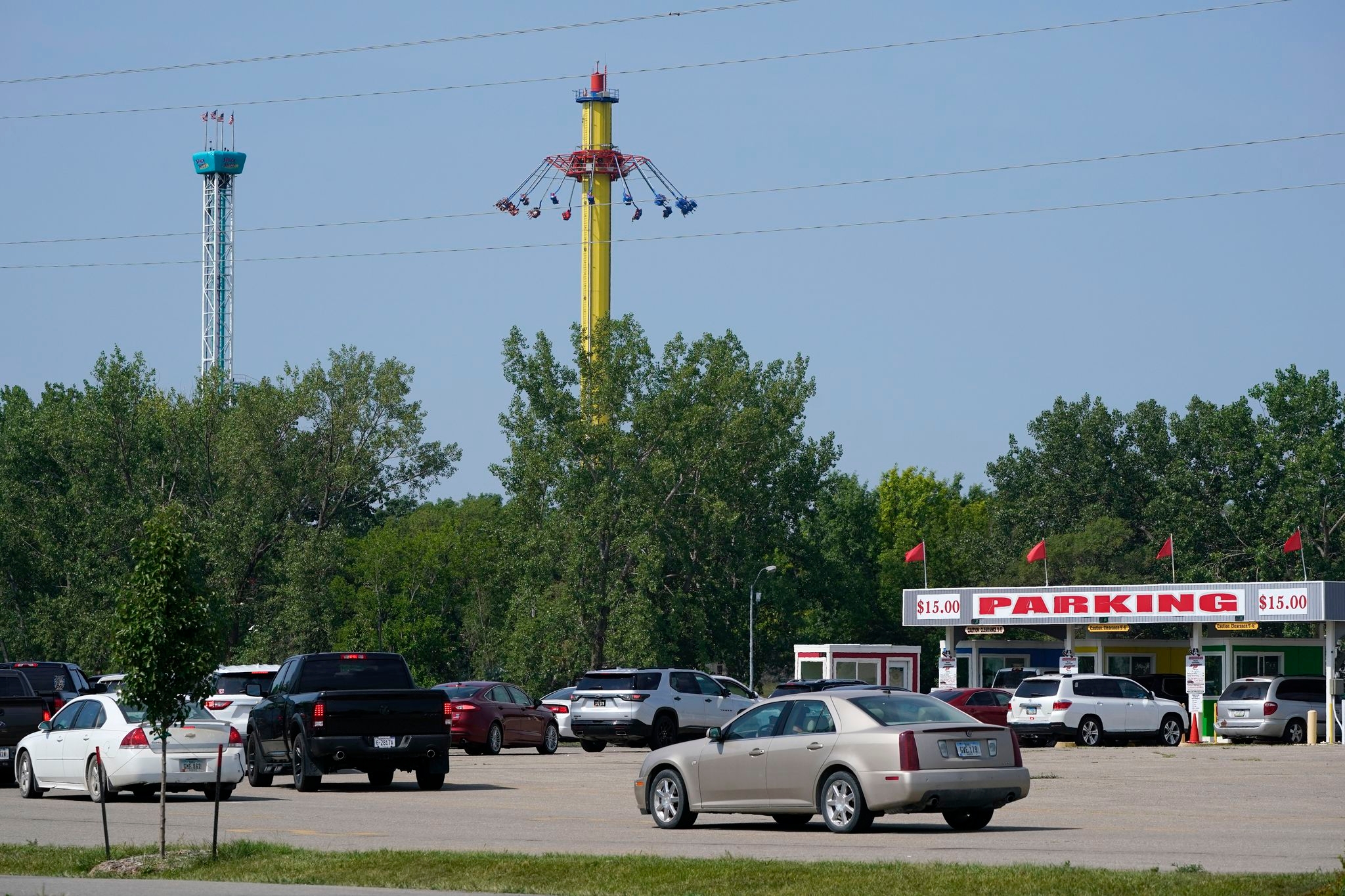 Iowa amusement park's former owner settles lawsuit over 11-year-old's drowning