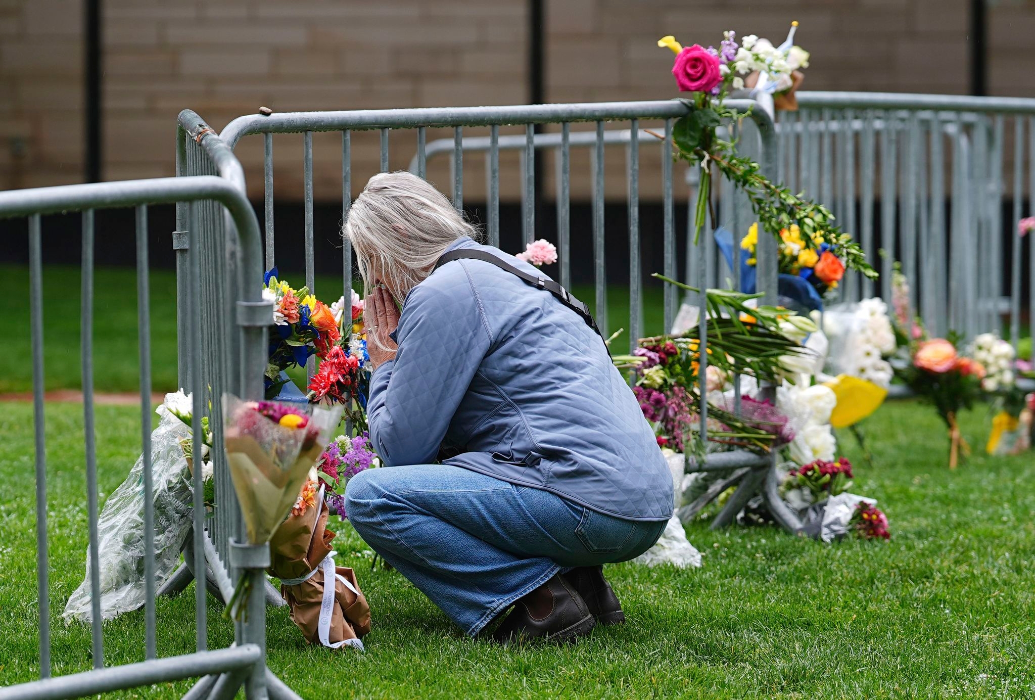 Vigil held for victims of Boulder firebombing attack as suspect's family fights deportation