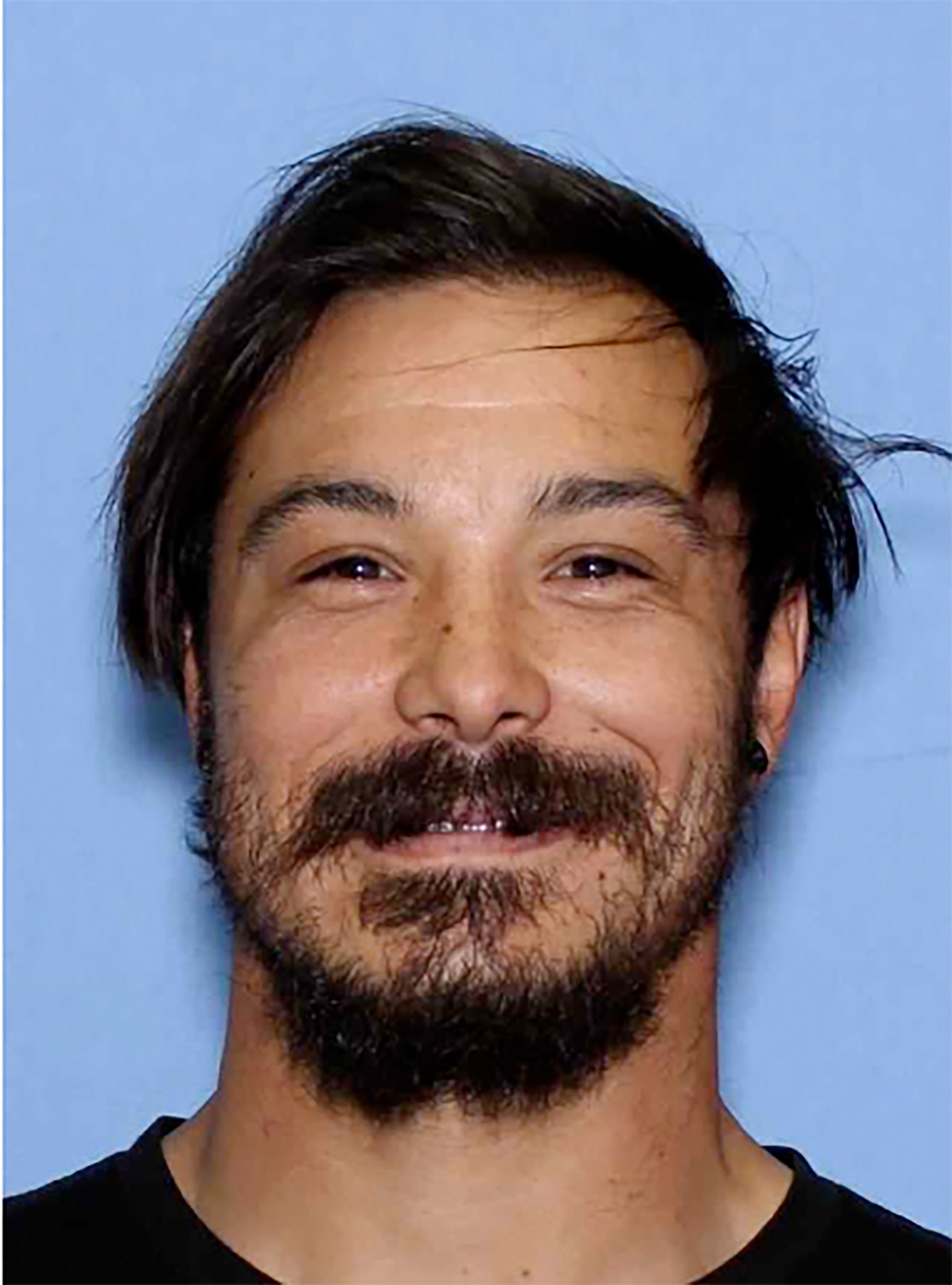 Authorities are searching for a Washington state father of 3 dead girls