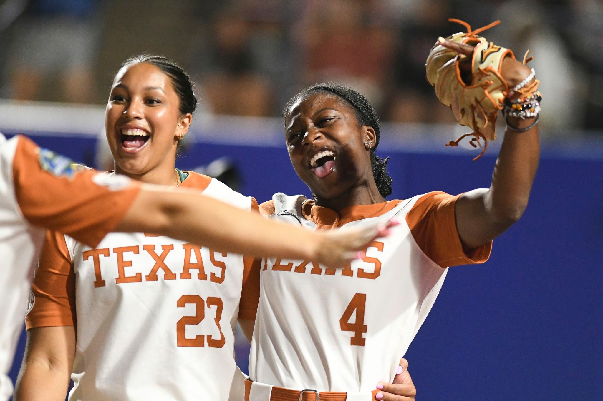 Atwood's hit on intentional walk attempt gives Texas a 2-1 win over Texas Tech in WCWS finals opener