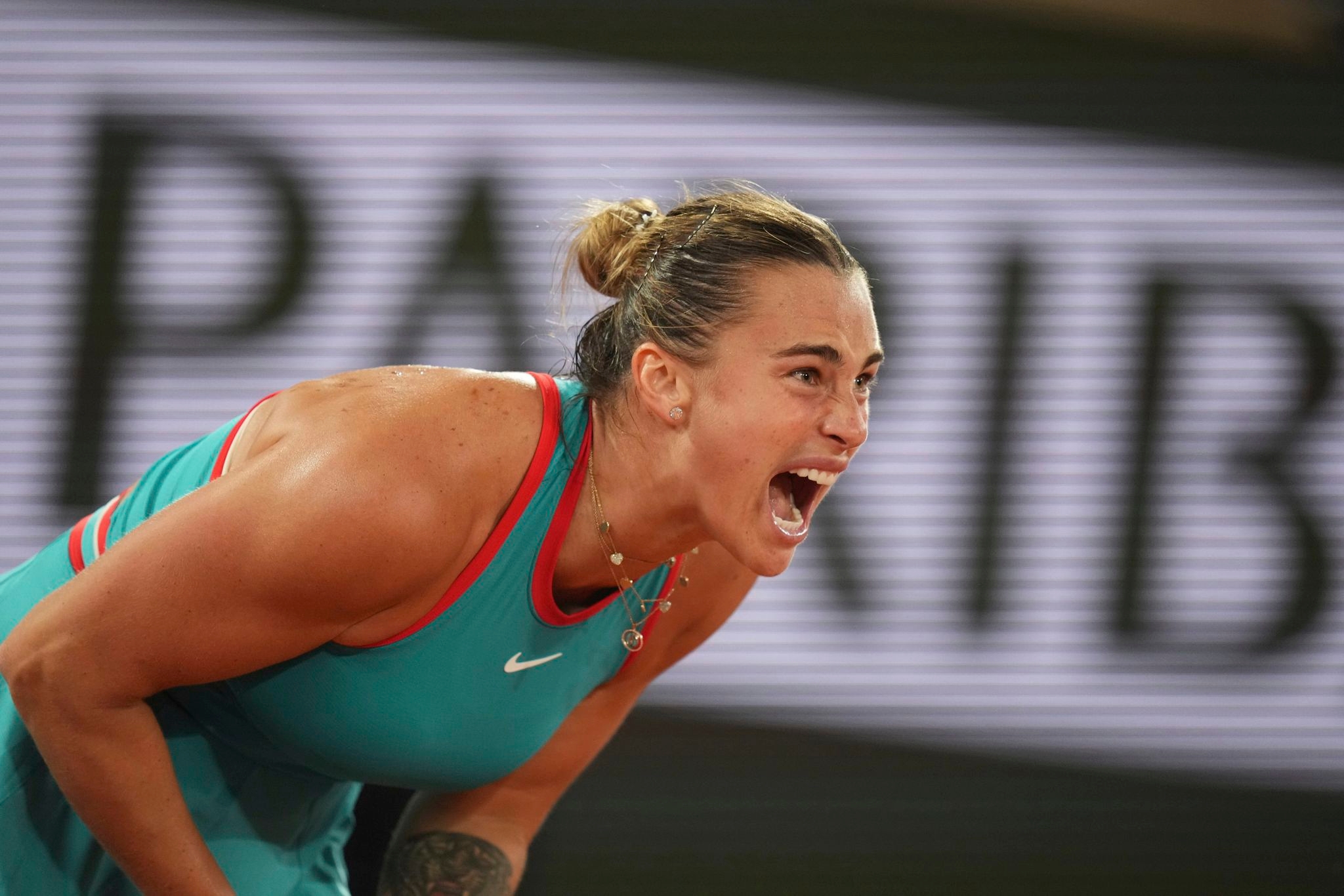 No. 1 Aryna Sabalenka ends Iga Swiatek's 26-match French Open winning streak and reaches the final