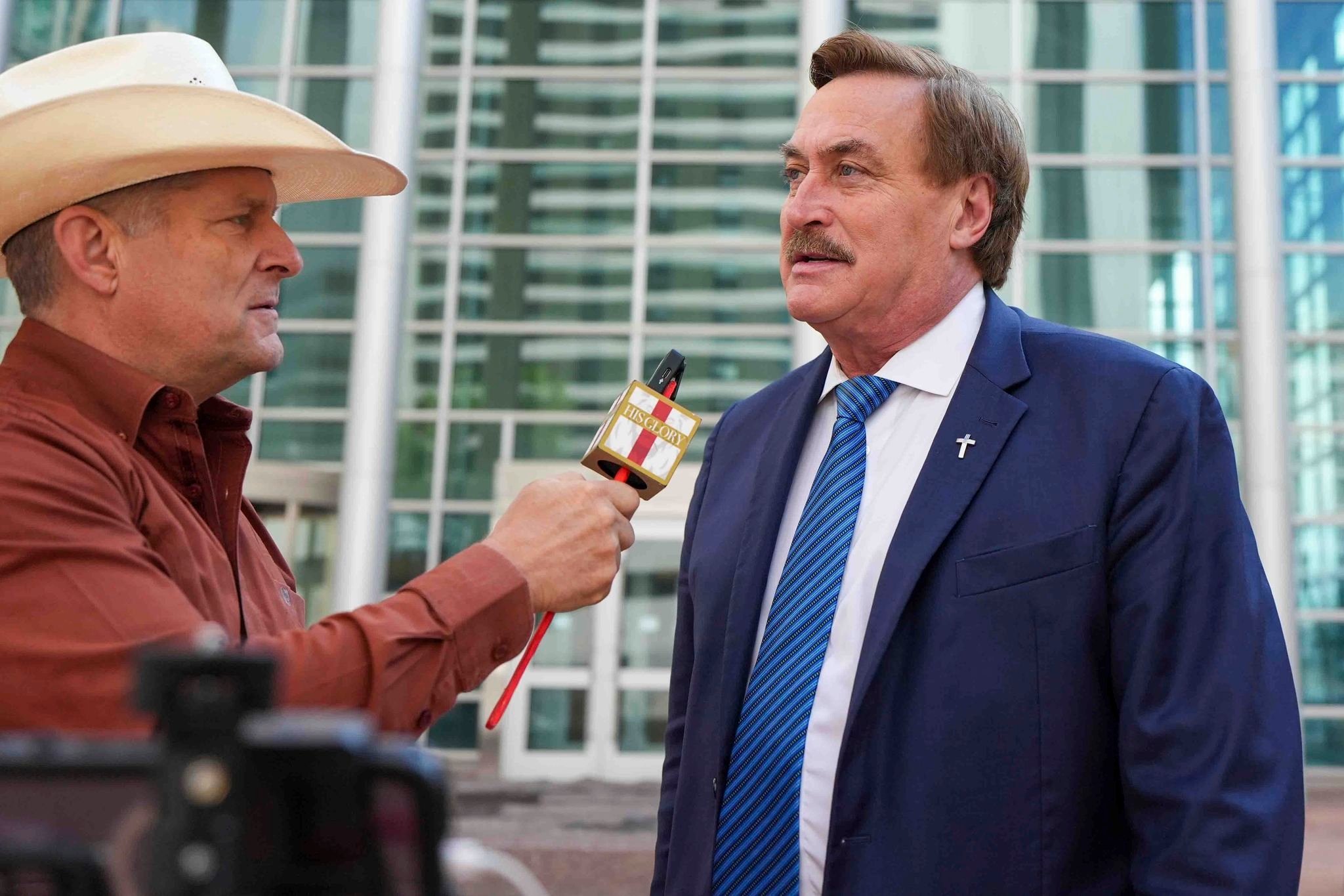 Election conspiracy theorist sticks by false 2020 claims in defamation trial
