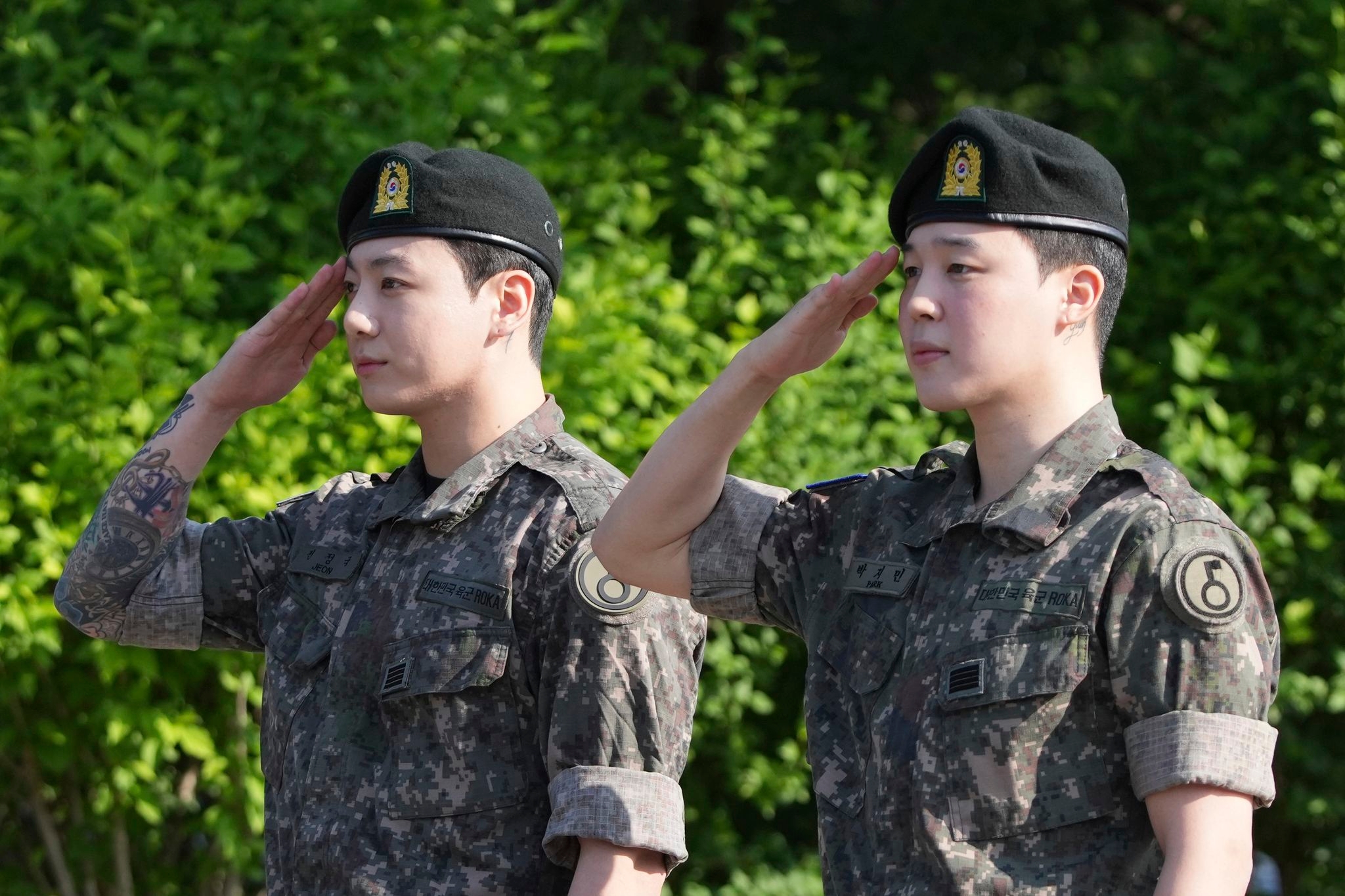 AP PHOTOS: BTS stars Jimin and Jung Kook discharged from military service
