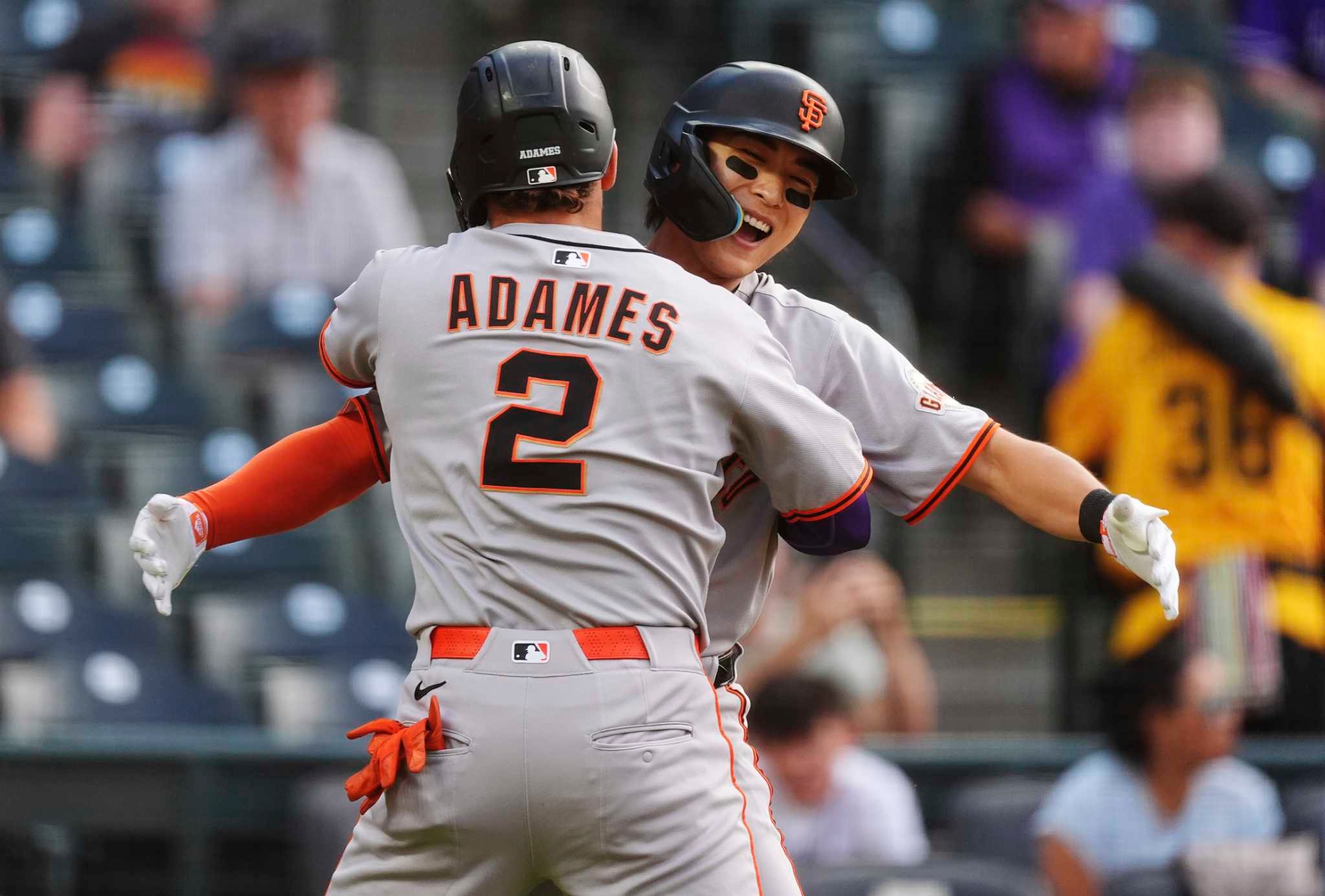 Giants' offense erupts to rally past Rockies for 7th straight win, but historic streak ends