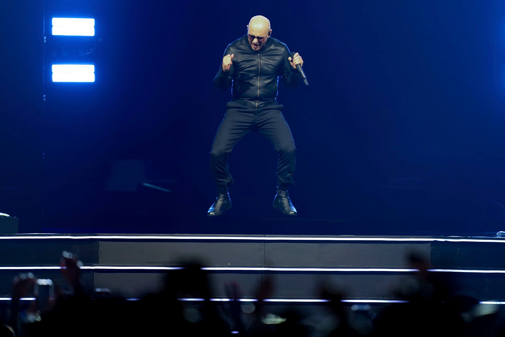Pitbull is a fan of his fans. He says it's his job to make them feel good