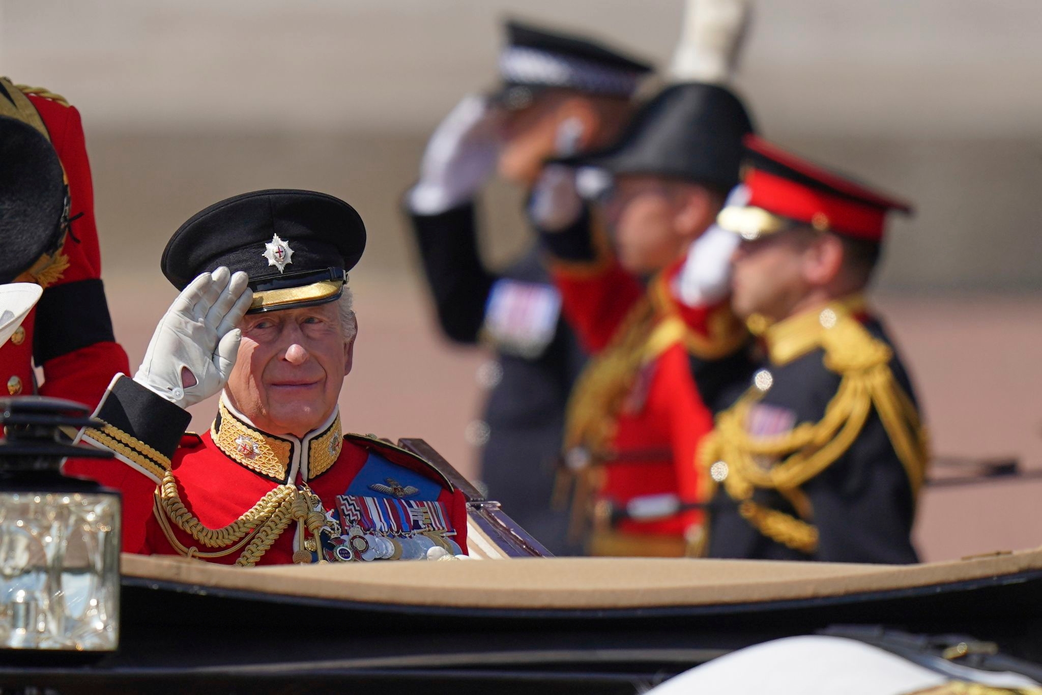 Photos show the British royals at the Trooping the Colour parade