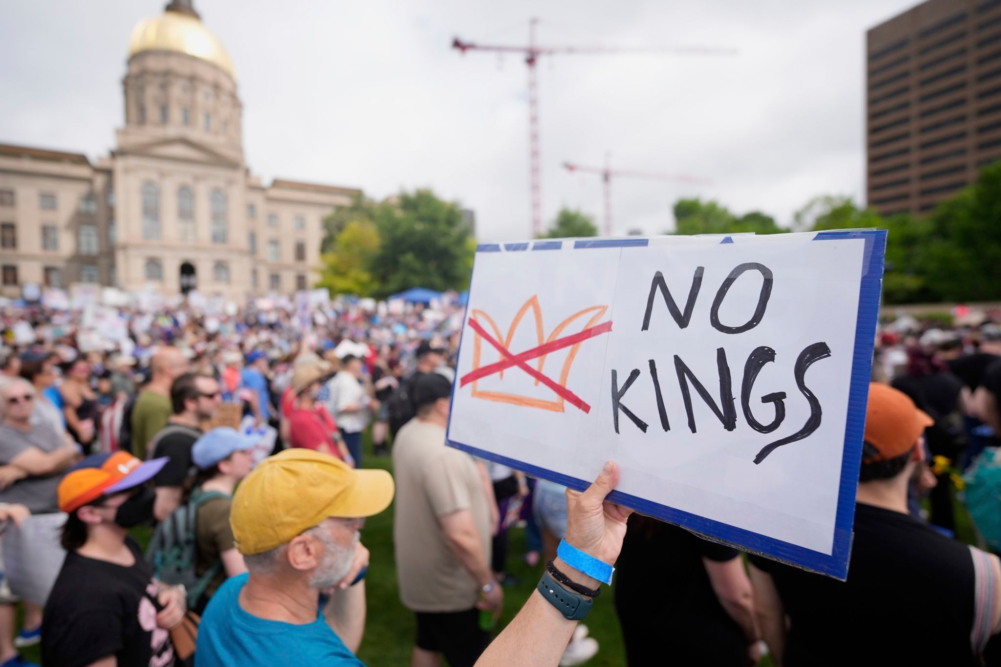 Protesters crowd into parks and plazas at anti-Trump 'No Kings' demonstrations across the US
