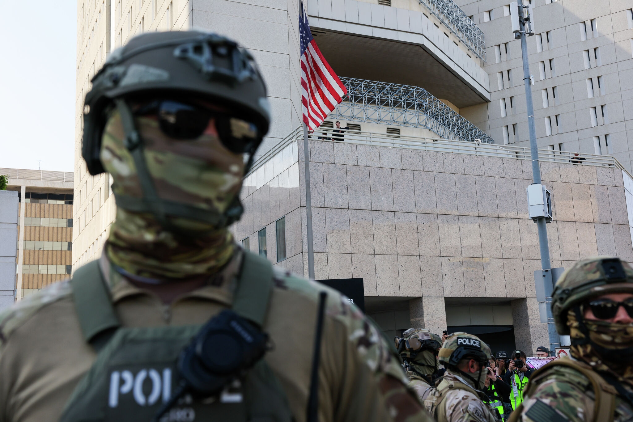 Can state make officers show their faces during protests? Experts appear doubtful