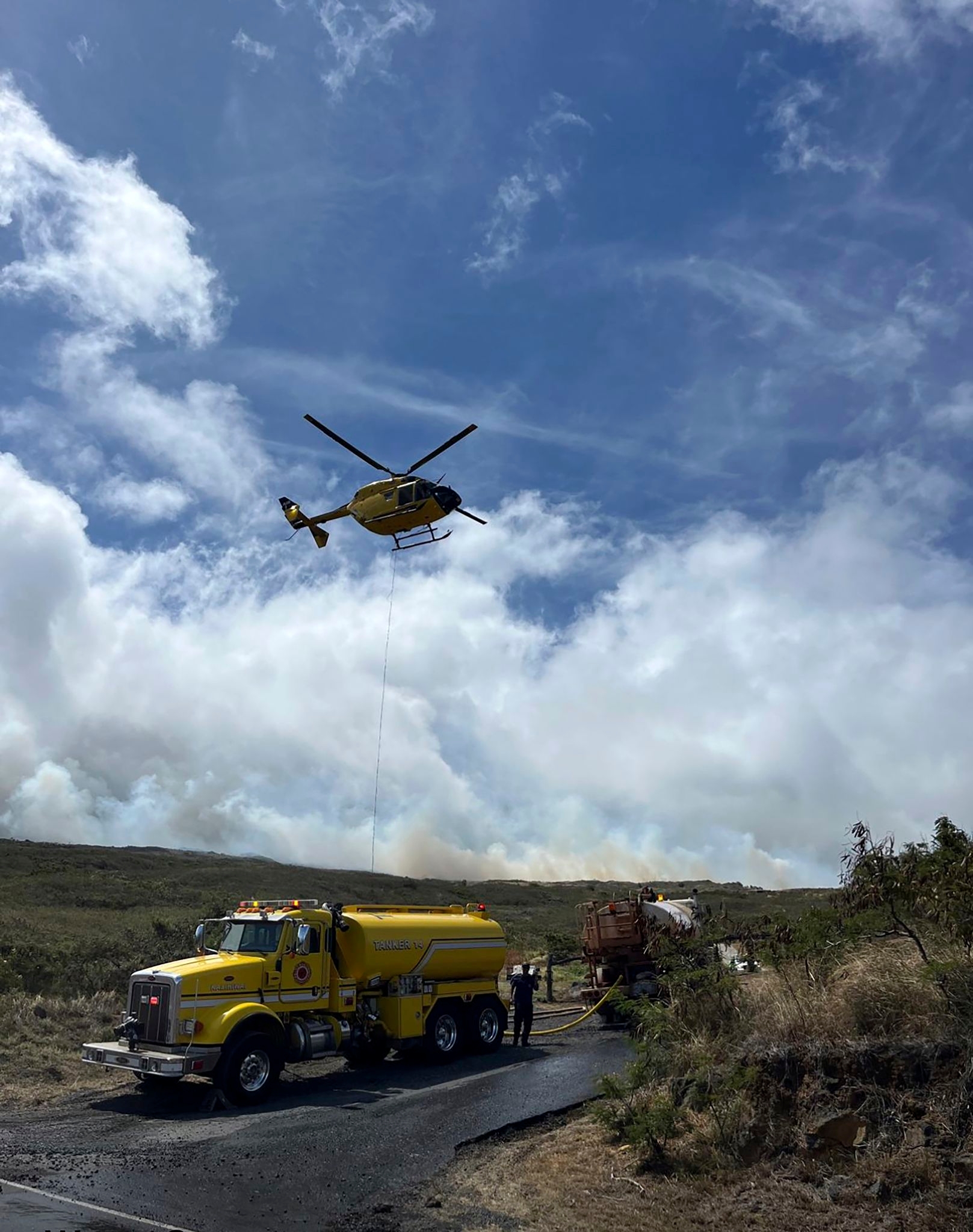 Fast-moving brush fire on Hawaii's Maui island evacuates about 50 people. No structures have burned