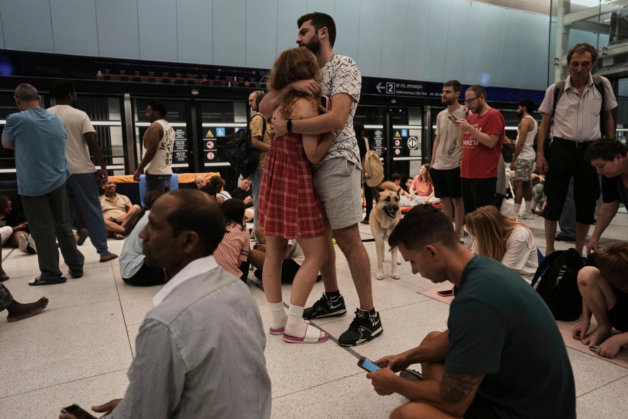 Fearful of Iranian missiles, many sleep in Israel's underground train stations