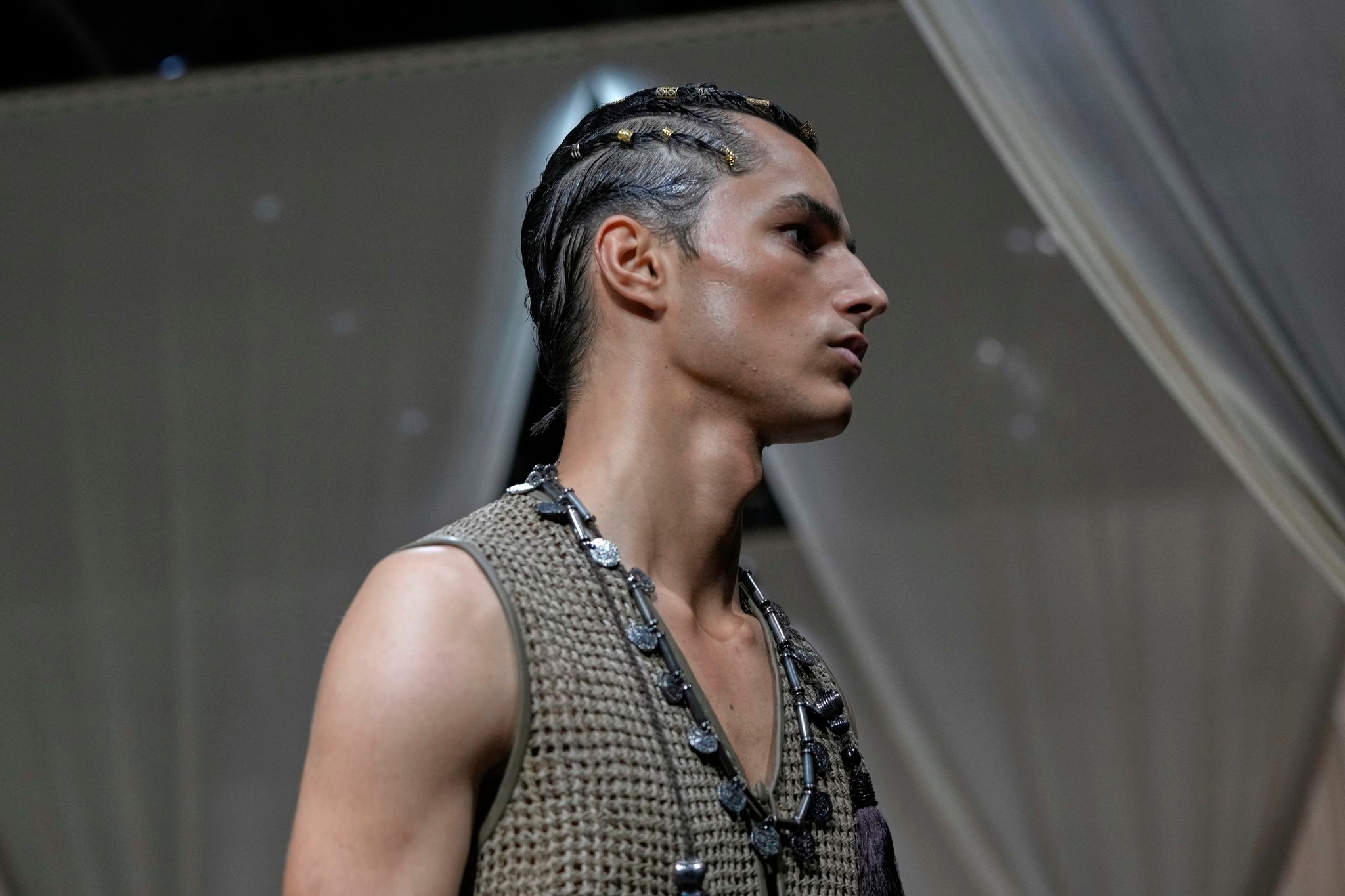 Armani's global aesthetic shines in bohemian Emporio Armani show, though designer misses Milan bow