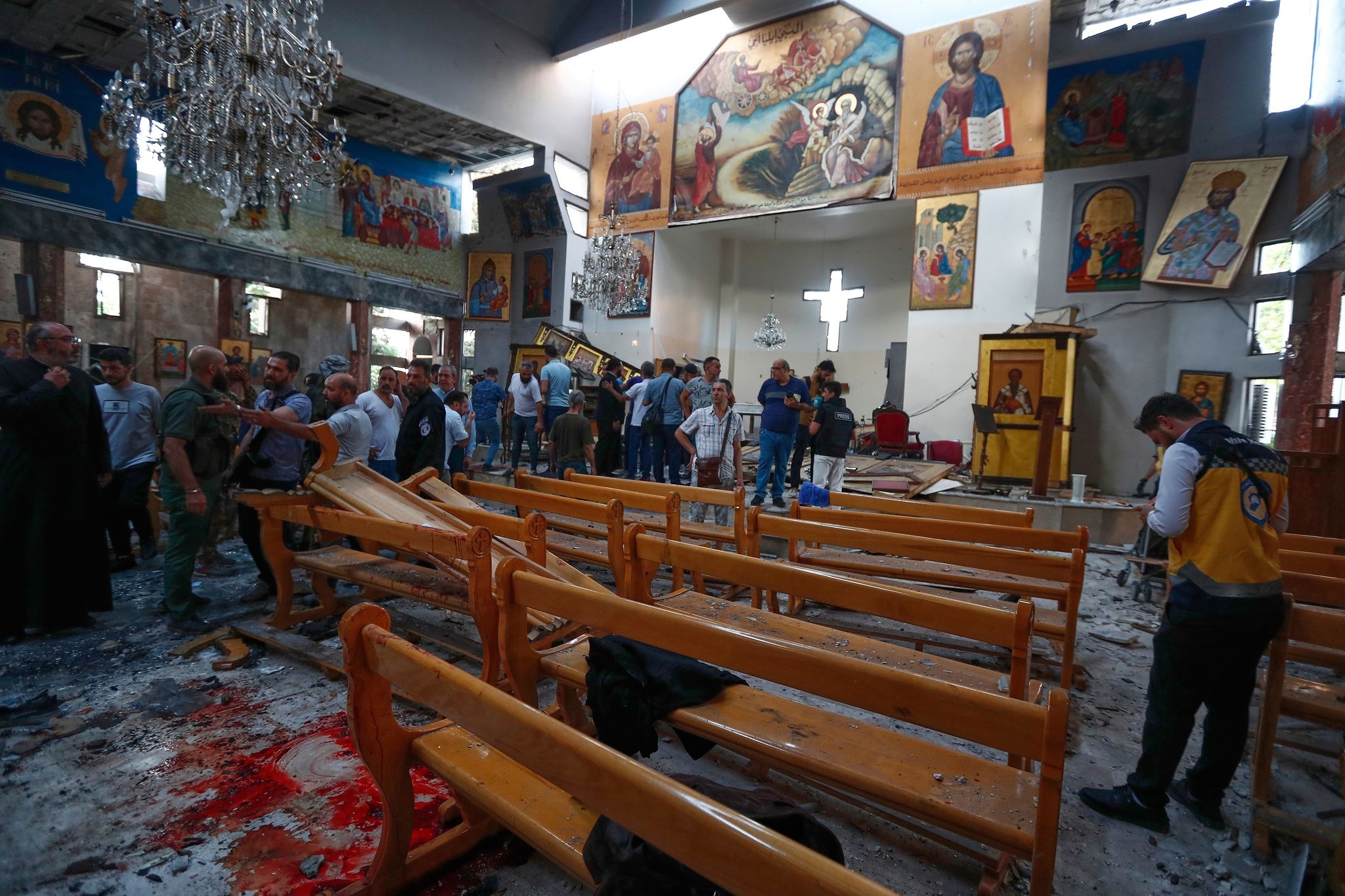 Mideast governments condemn Syria church bombing as death toll jumps to 25