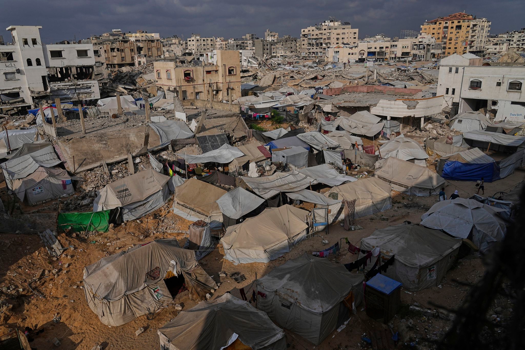Israeli forces fire on people waiting for aid in Gaza, killing 25, witnesses and hospitals say