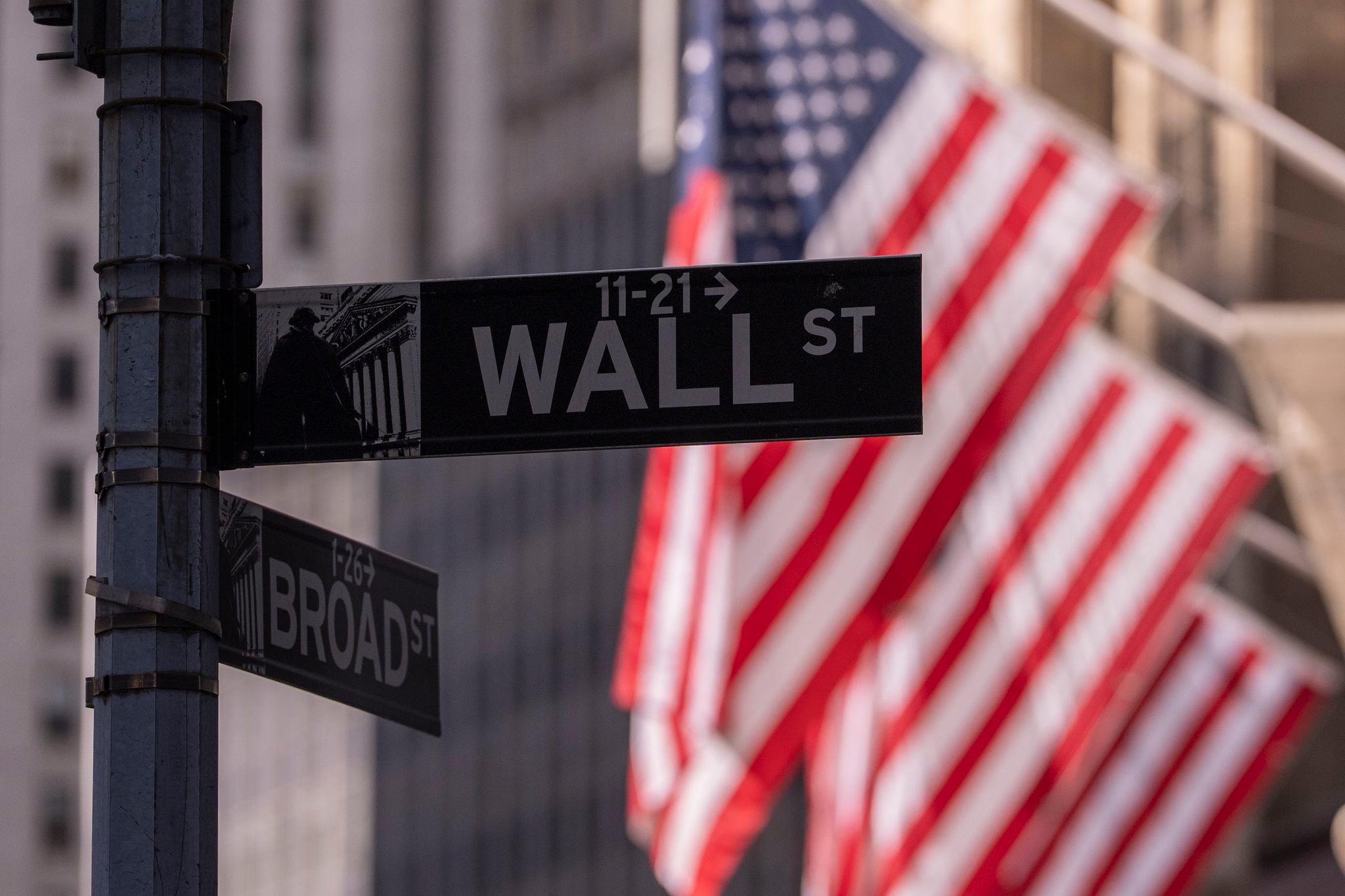 Asian shares are mixed, tracking Wall Street split as momentum slows and Tesla drops