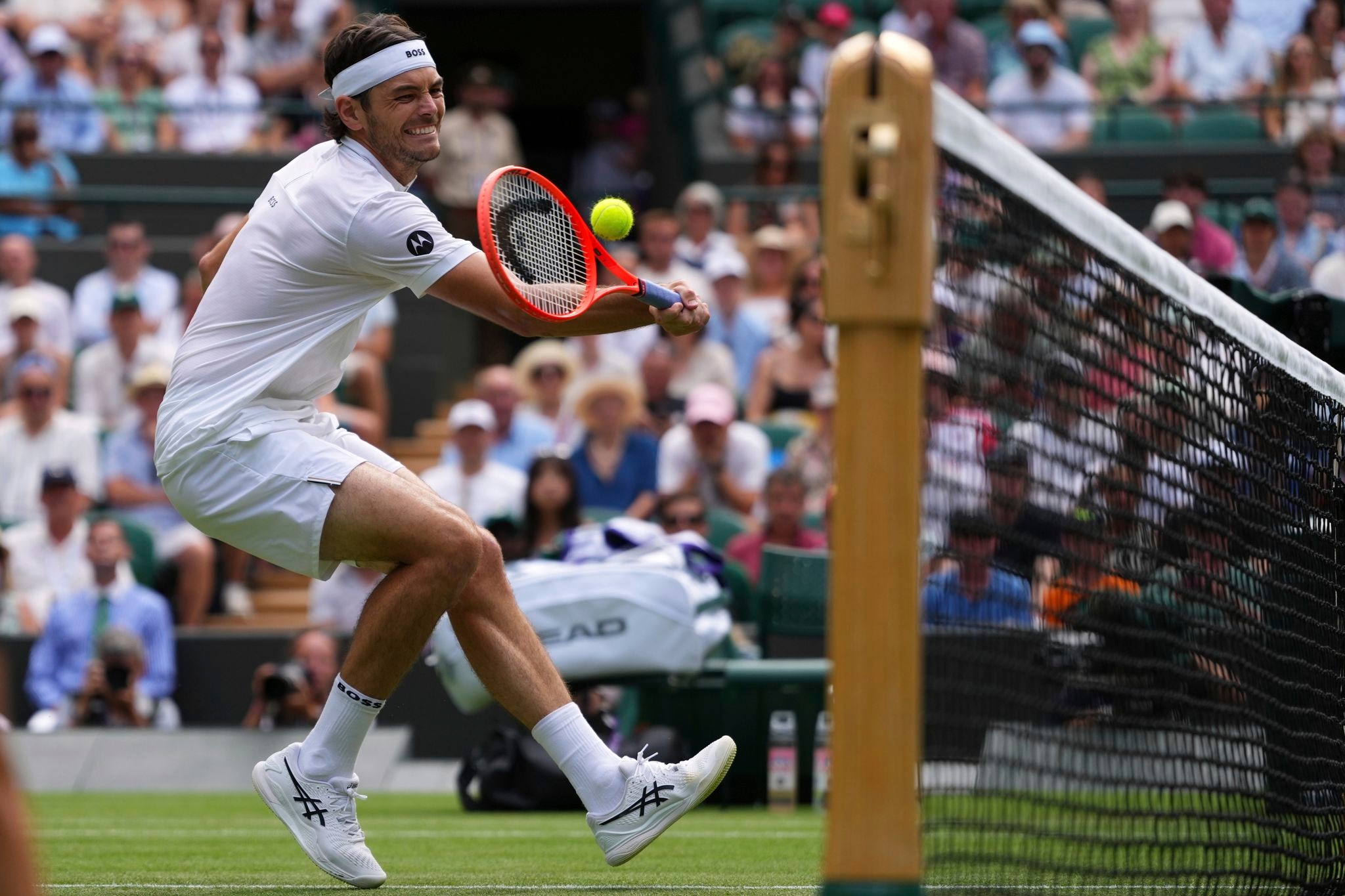 Taylor Fritz wins resumed Wimbledon match in which Mpetshi Perricard hit a record 153 mph serve