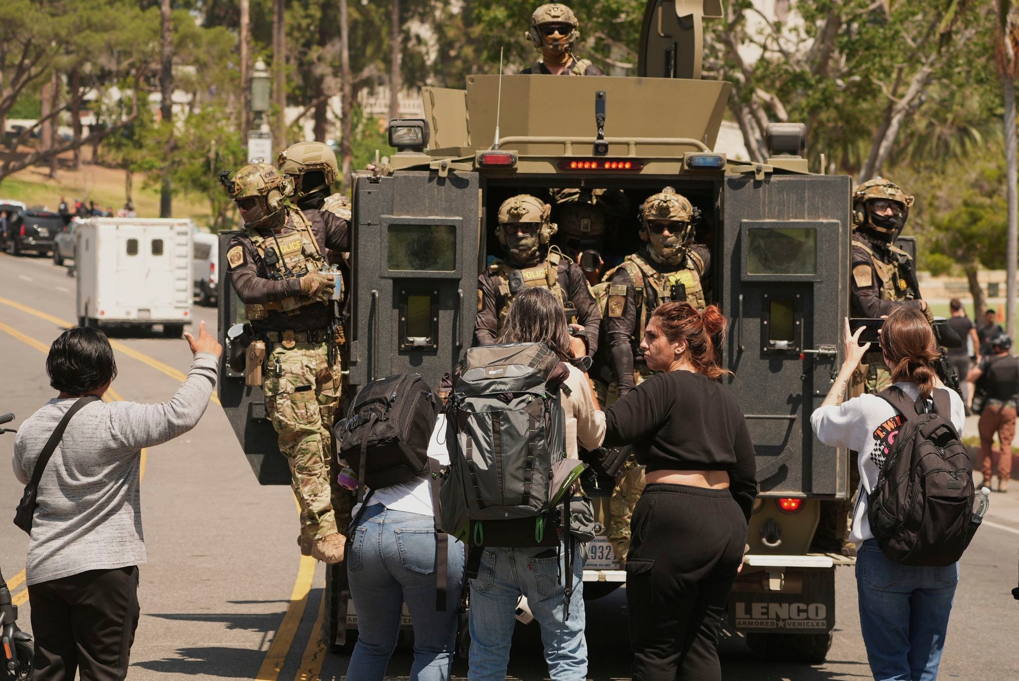 Troops and federal agents briefly descend on LA's MacArthur Park in largely immigrant neighborhood