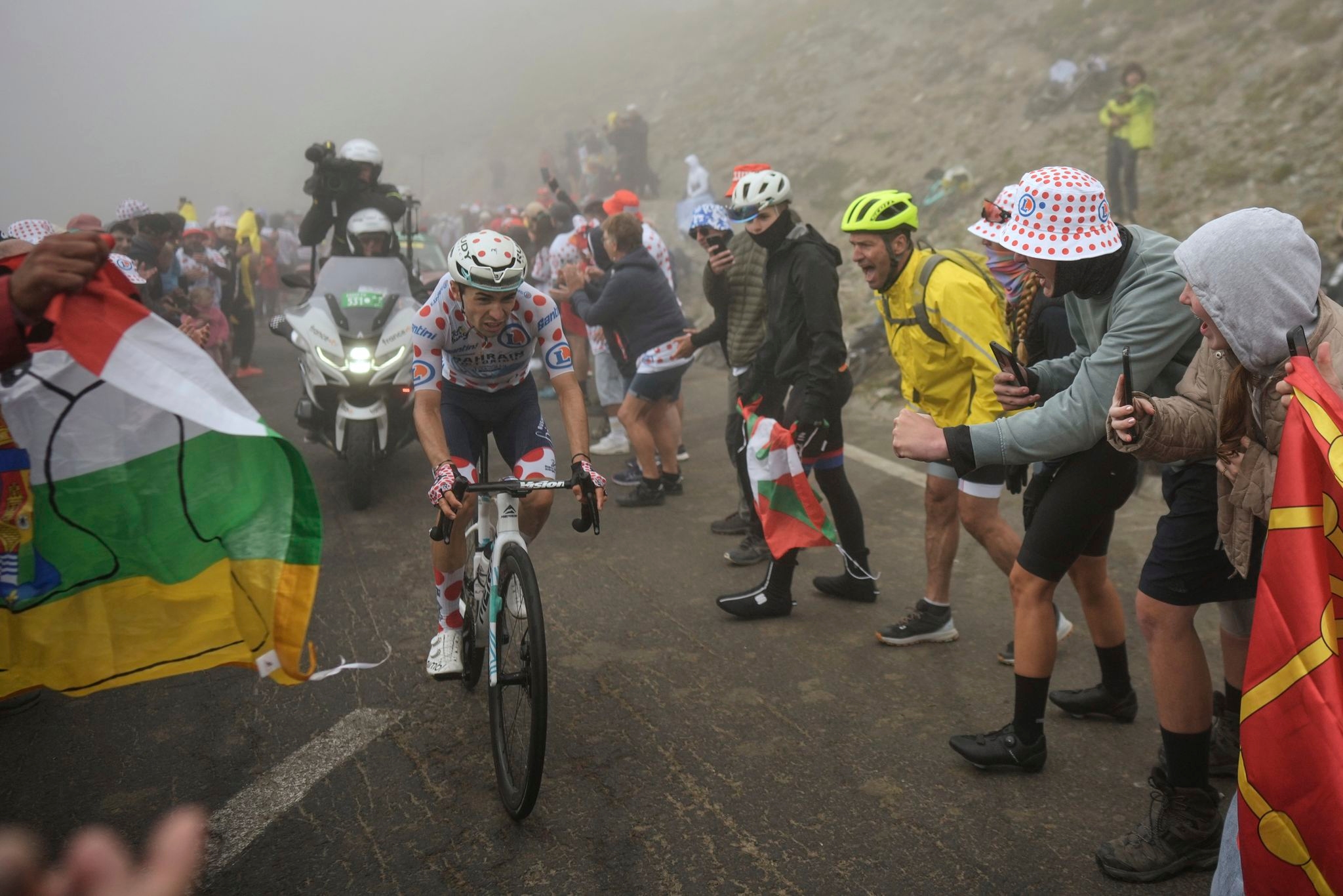 Ineos-Grenadiers team car hits spectator during Tour de France