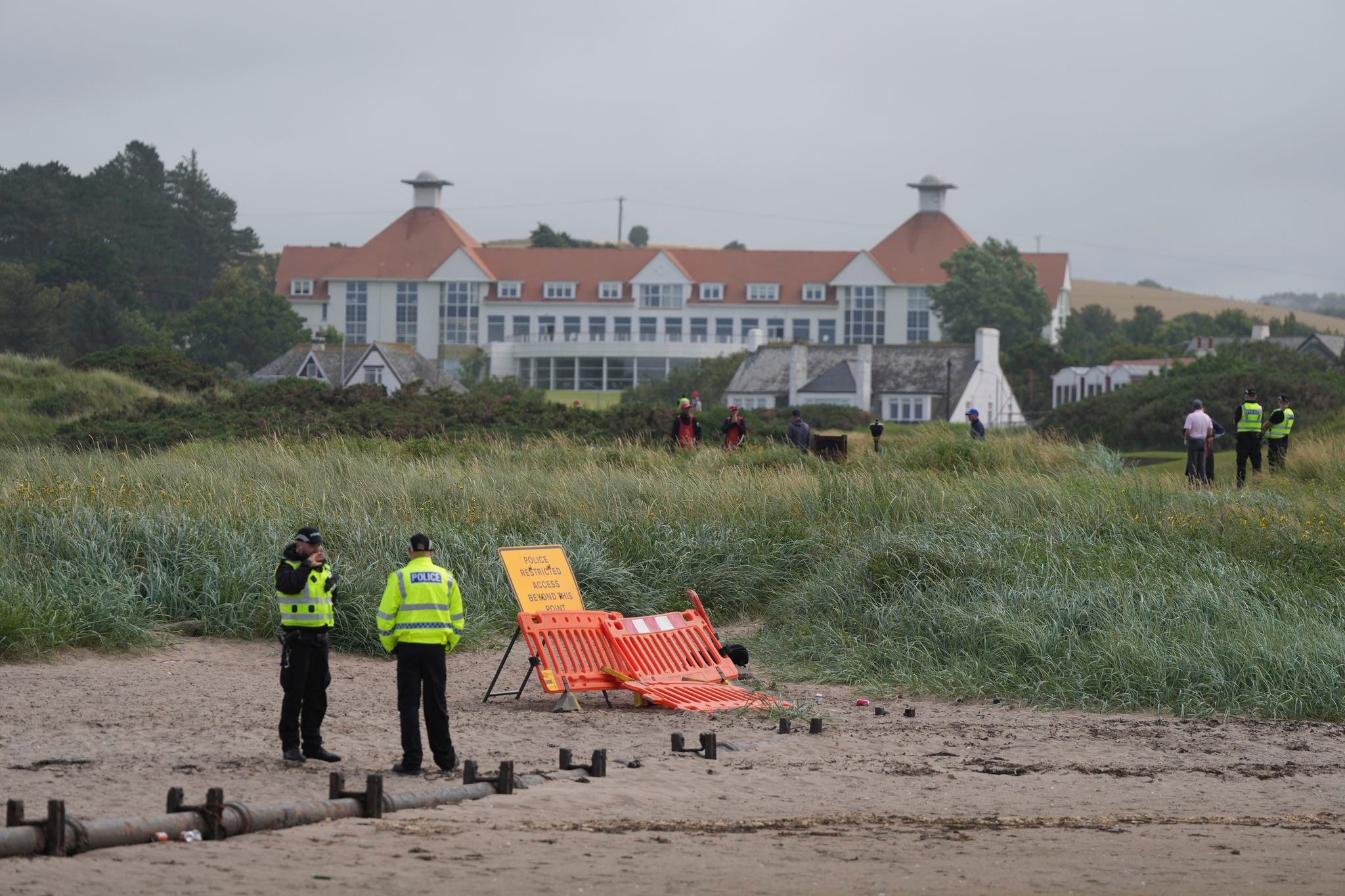 The Latest: Trump leaves for Scotland to inaugurate a new golf course in Aberdeenshire