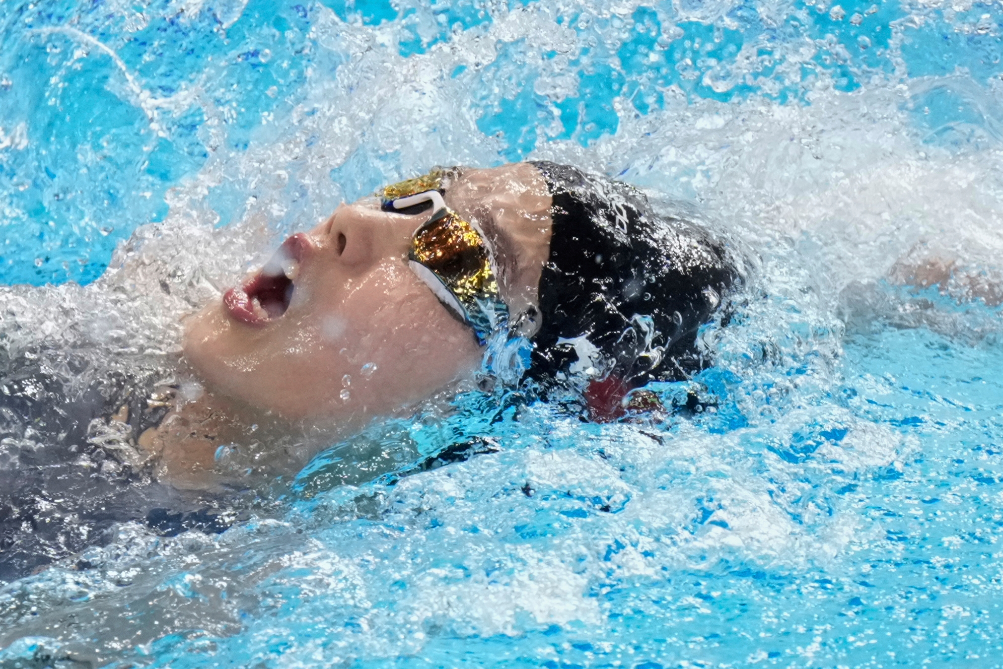 Chinese 12-year-old swimmer Yu Zidi makes her debut on world stage -- and doesn't disappoint