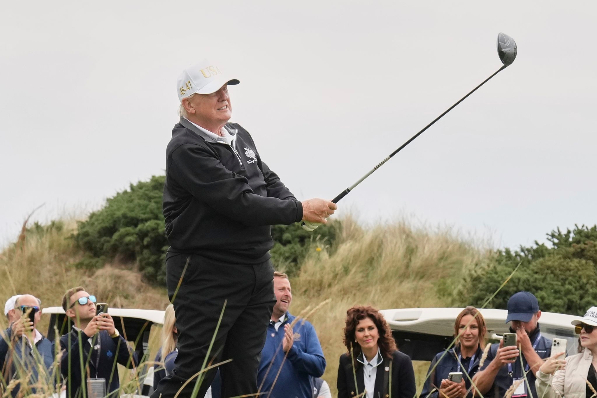 The Latest: Trump inaugurates his family's newest luxury golf course in Scotland