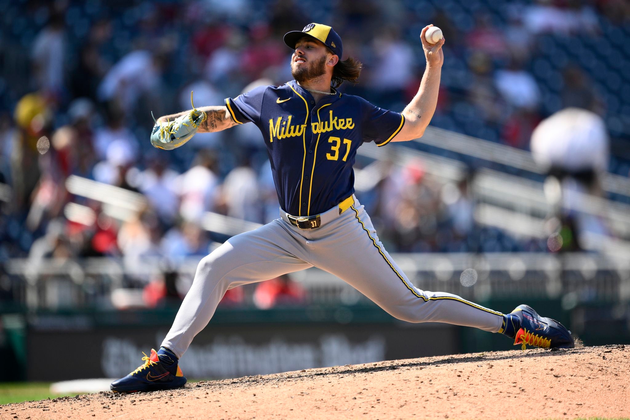 Turang homers twice as the Brewers pound the Nationals 14-3 for a sweep of their season series