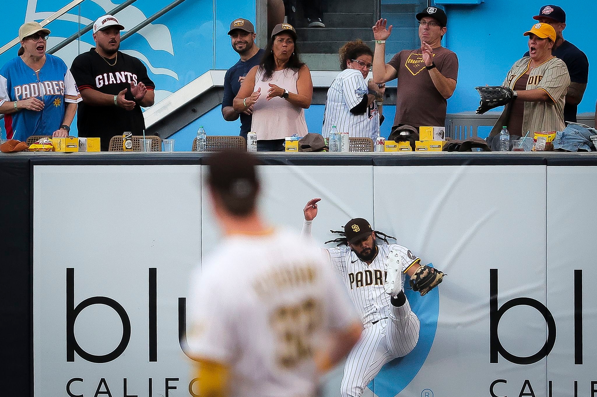 Sheets hits 2 of San Diego's 4 homers, Tatis robs Devers as the Padres beat the Giants 8-1