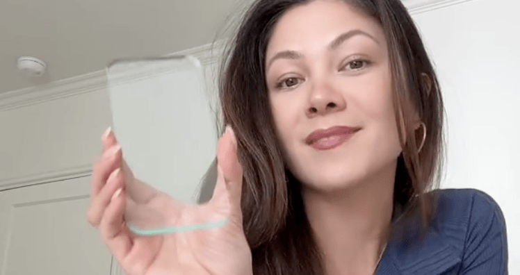 A video of a woman using a transparent 'phone' went viral. But can it actually help curb your smartphone addiction?