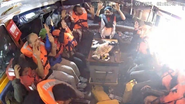 Activists say Israeli troops have boarded aid ship