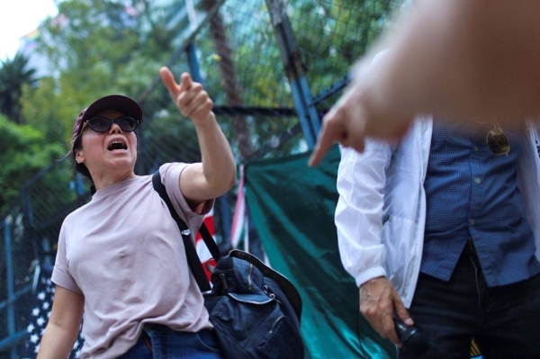 Protesters outside US Embassy in Mexico City call for end to immigration raids across the border