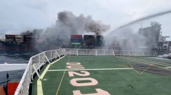 Officials race to tow burning ship away from India coast to prevent 'ecological disaster'