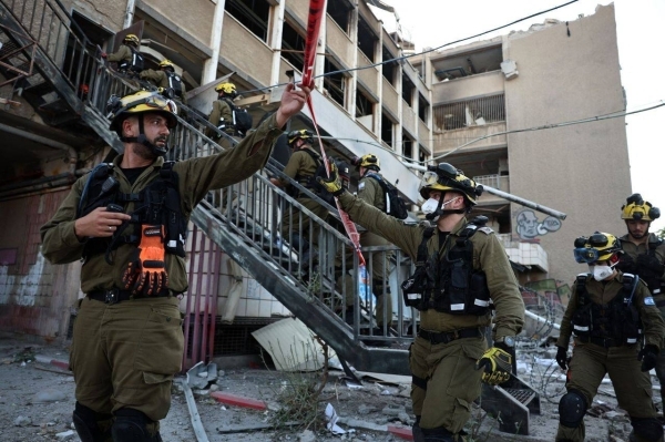 Fresh missile barrage hits Israeli port city as high-level talks begin in Geneva