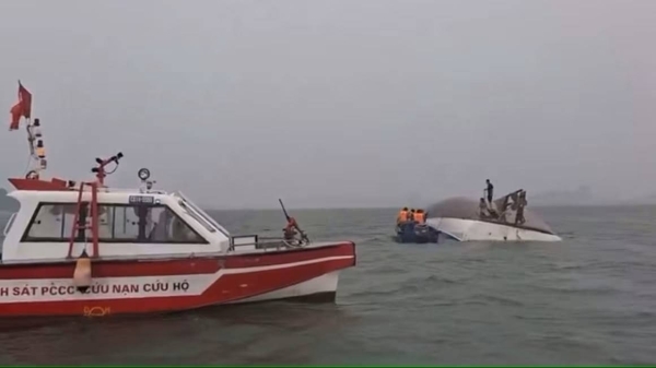 Boy survives Vietnam boat sinking that killed dozens by sheltering in air pocket