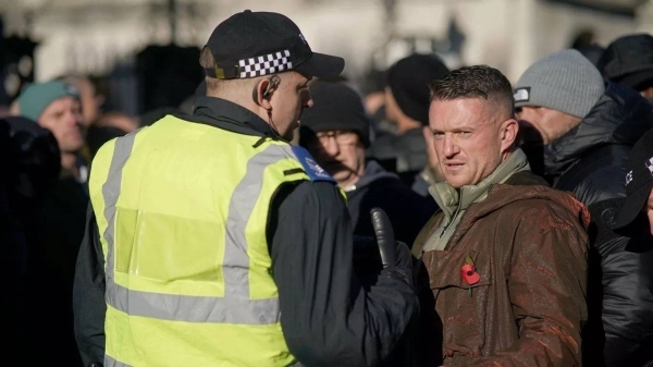 Far-right figure Tommy Robinson arrested over alleged assault in London train station