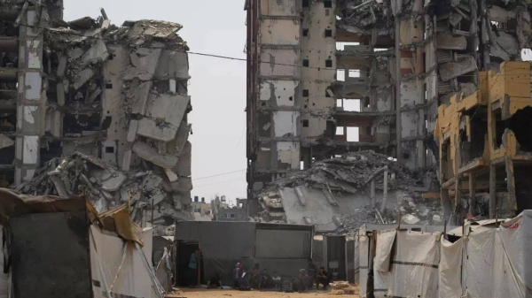 At least 100 Palestinians killed in Israeli attacks across Gaza