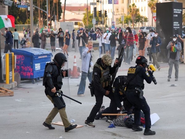 Protests in LA intensify over federal immigration sweeps, tear gas used