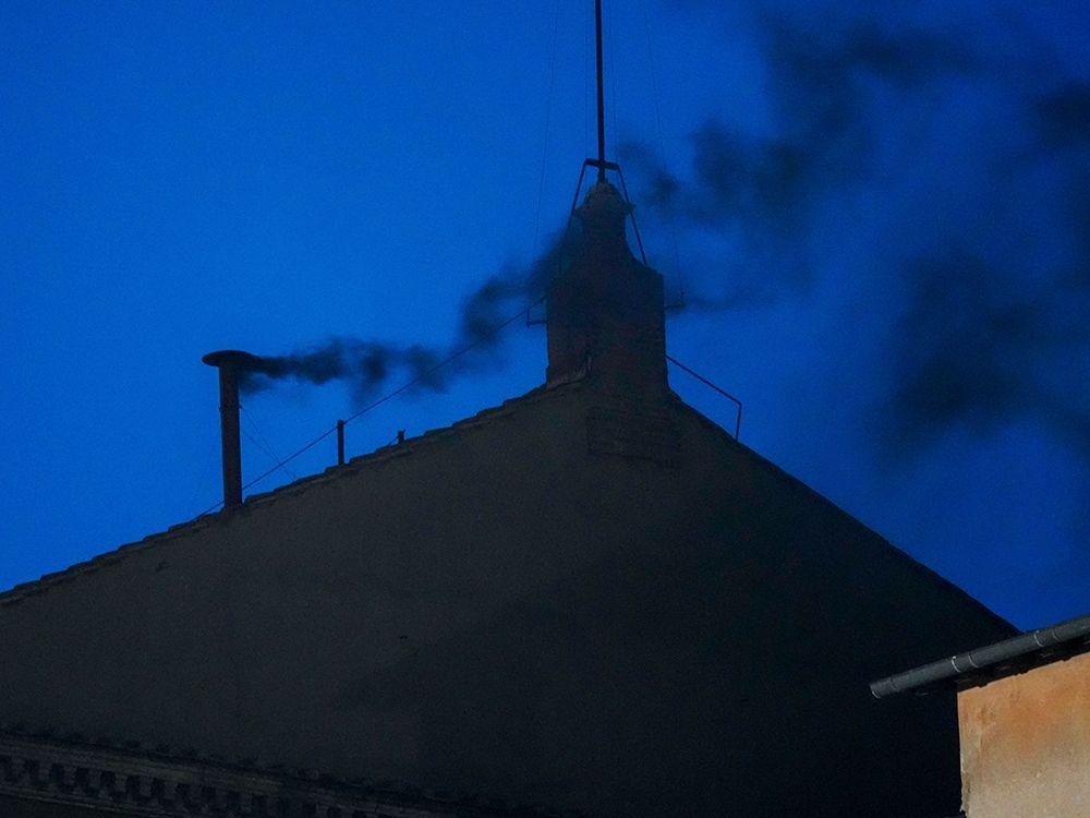 Conclave indicates it has not elected pope on first vote as black smoke rises from Sistine Chapel