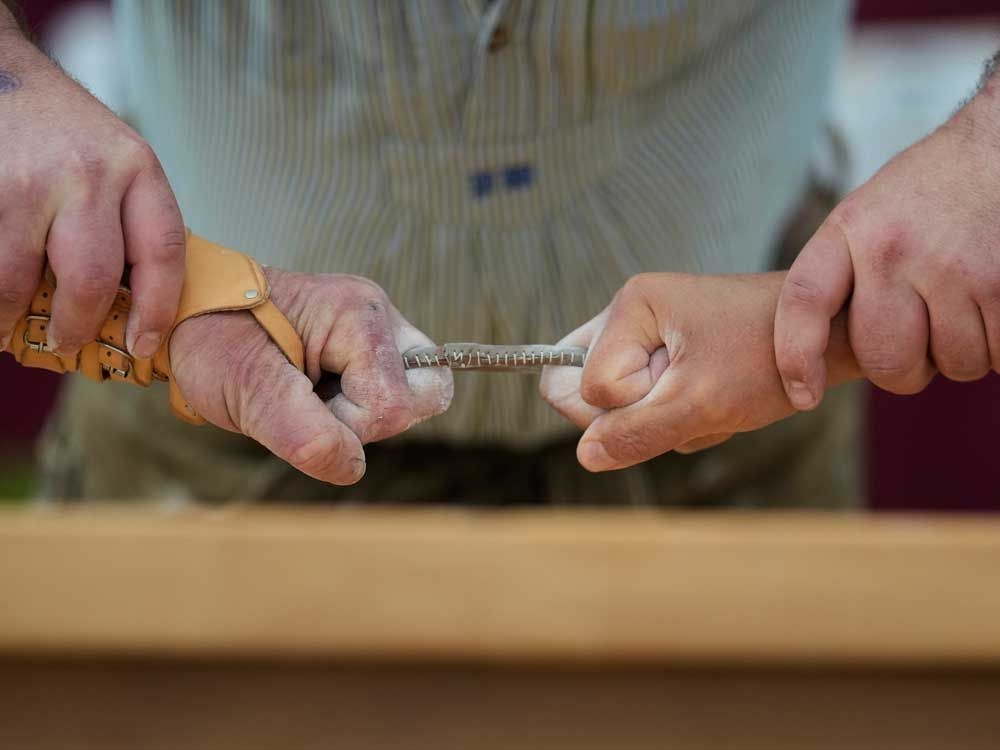 Bloody fingers are just part of the game in this traditional German sport